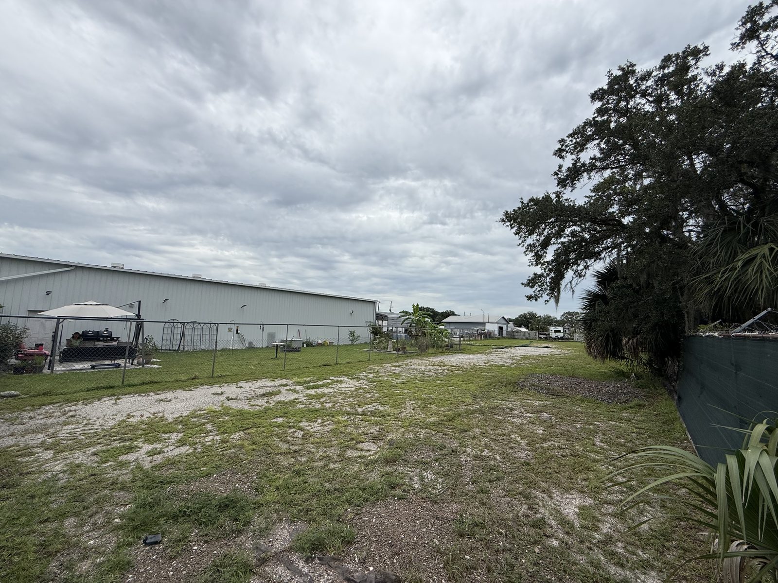 Side yard and drive between structures